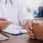 Affordable Care Act vs. Obamacare: What’s the Difference? healthcare professional discussing affordable care act vs obamacare