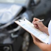 The Individual Mandate: What Employers Need to Know Insurance agent conducts inspection of the damaged car by filling out documents
